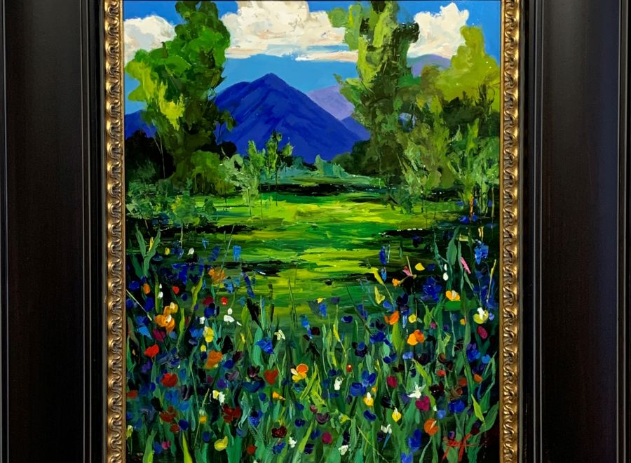 A Framed Painting Of A Landscape