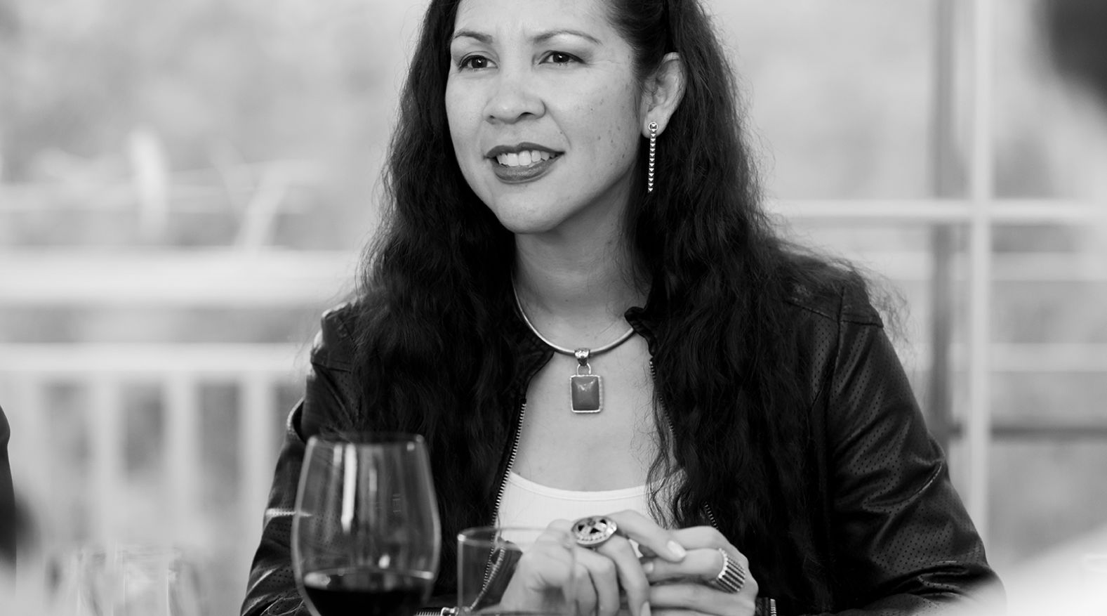 Bell Hooks Holding A Glass Of Wine
