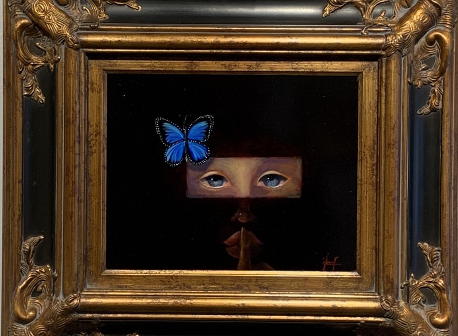 A Framed Painting Of A Person