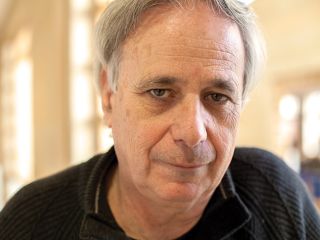 Ilan Pappe Wearing Glasses And Smiling At The Camera