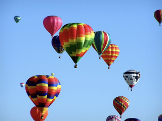 A Group Of Hot Air Balloons In The Sky